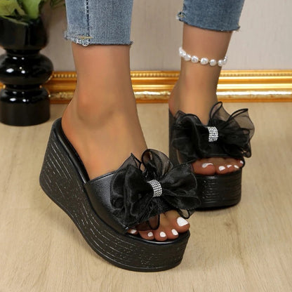 BOW WEDGE HEEL SANDALS